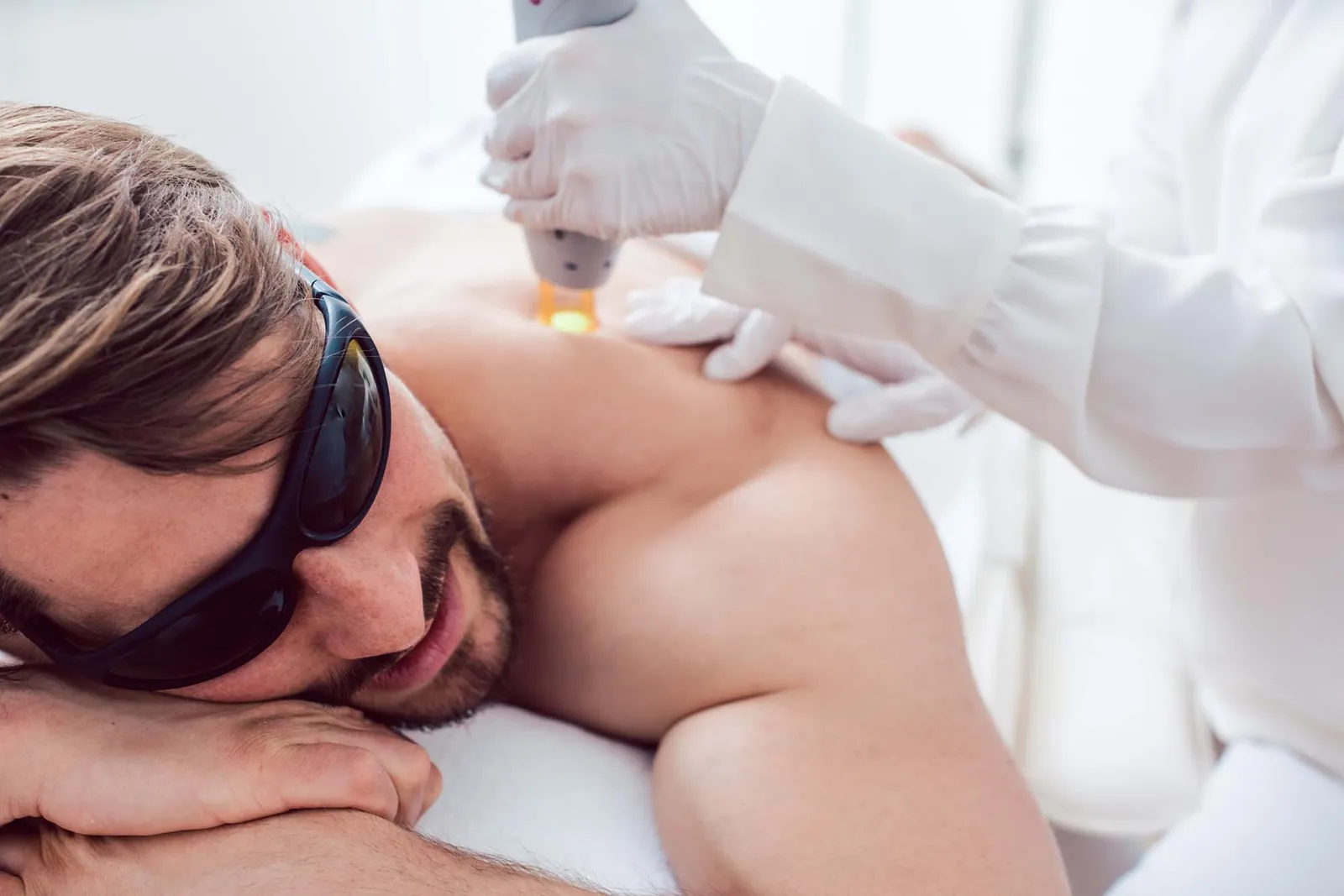 Man in a hair removal studio