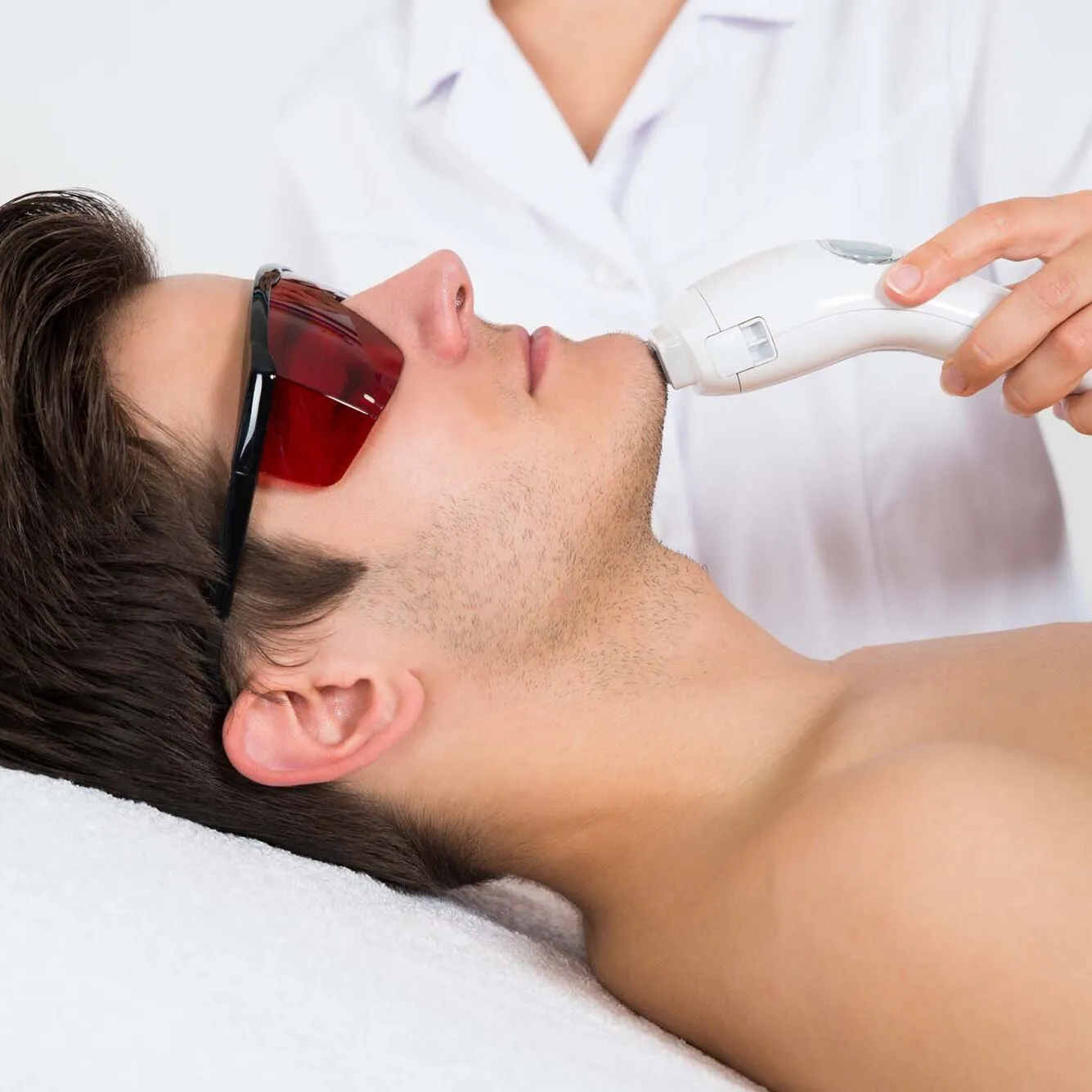 Man Receiving Laser Hair Removal Treatment